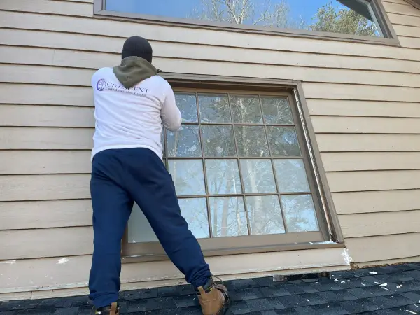 Crescent installer setting a new window in Suwanee